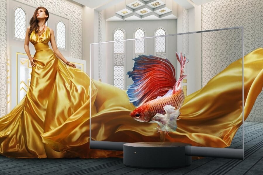 Transparent OLED technology used in a digital art exhibition to blend physical and virtual elements seamlessly.