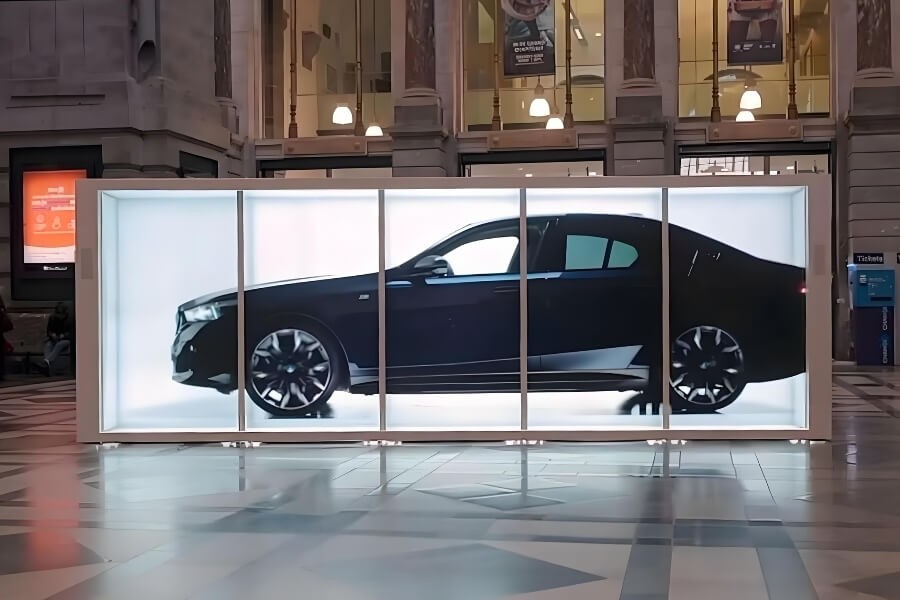 Transparent OLED display integrated into retail space for immersive product visualization