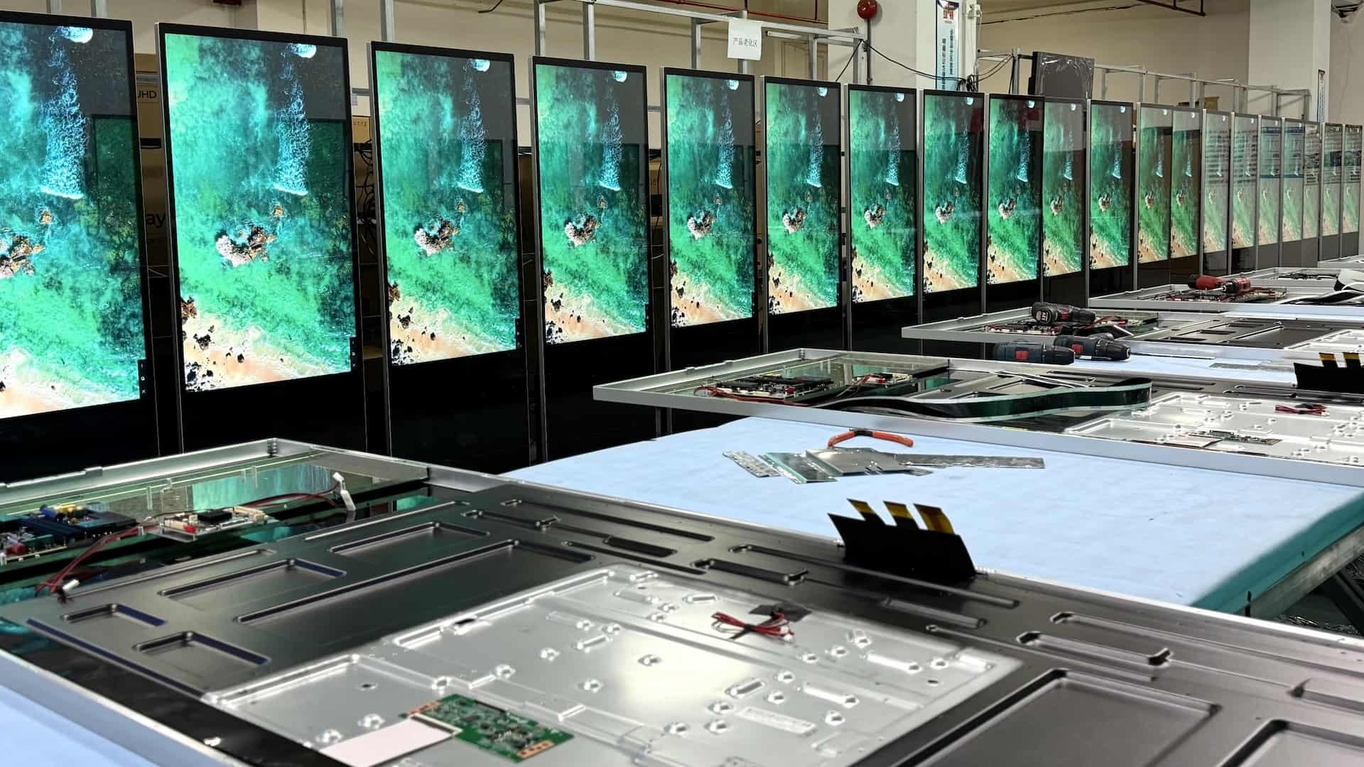 Batch of 80 55-inch floor-standing digital signage kiosks prepared for shipment to Europe